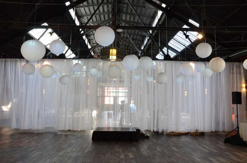 White Paper Lanterns and String Lights & Up-Lights for a wedding at 26 Bridge (Brooklyn, NY)