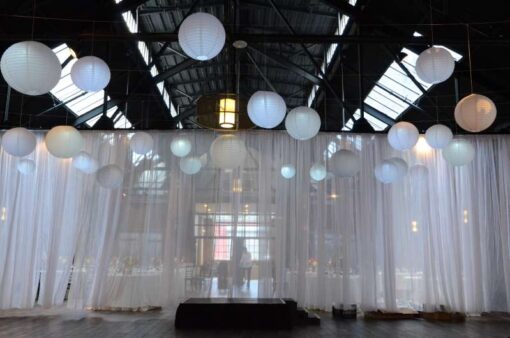 White Paper Lanterns and String Lights & Up-Lights for a wedding at 26 Bridge (Brooklyn, NY)