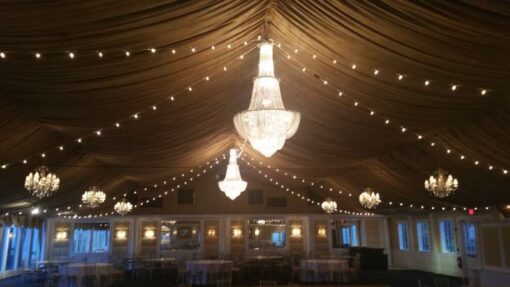 String Lights hanging in a zigzagging pattern for a wedding at The Bridgeview Yacht Club. (Island Park, NY).