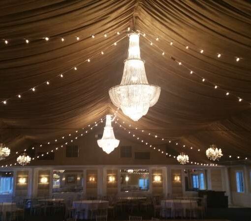 String Lights hanging in a zigzagging pattern for a wedding at The Bridgeview Yacht Club. (Island Park, NY).