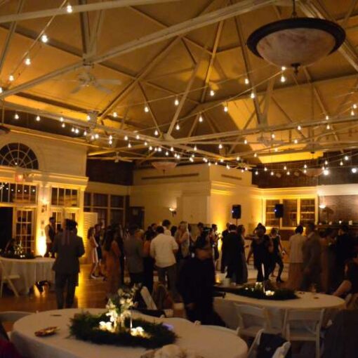 String Lights in a zigzagging pattern and Up-Lights along the perimeter walls inside The Prospect Park Picnic House (Brooklyn, NY).