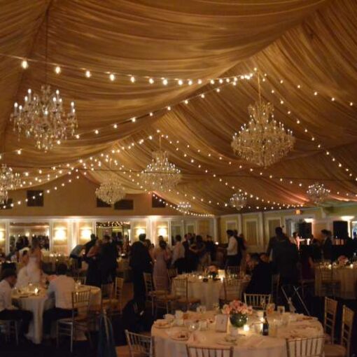 String Lights hanging in a zigzagging pattern for a wedding at The Bridgeview Yacht Club. (Island Park, NY).
