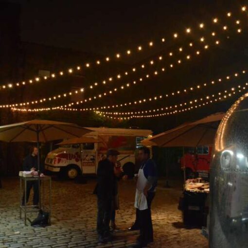 String Lights above the courtyard at The Foundry with out a tent or lighting stands.