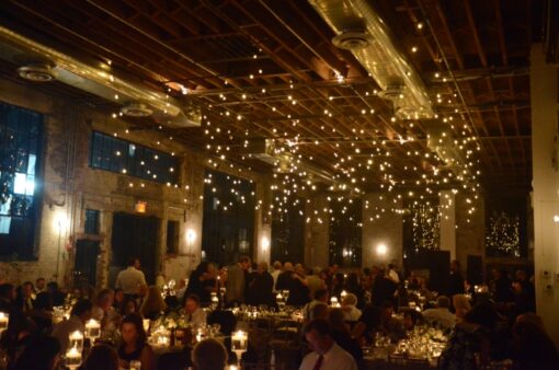 String Lights hanging over dance floor for a wedding at 99 Scott