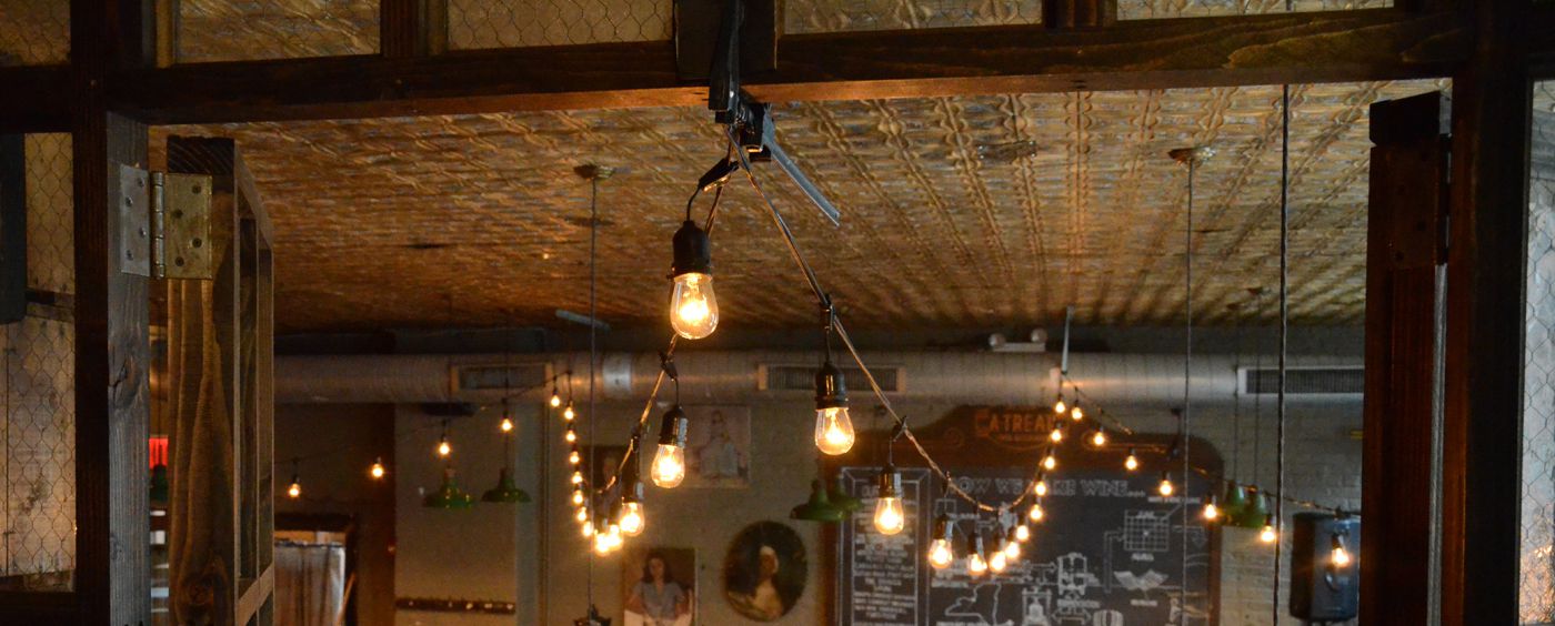The Brooklyn Winery (Brooklyn, New York) - 150ft of String Lights with S14 bulbs suspended  in a zigzag pattern in the Main Bar