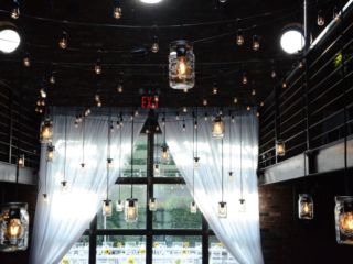 The Foundry (Long Island City, New York) - Pendant Lamps with Masson jars suspended from the mezzanine level