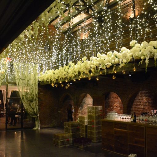 Icicle fairy lights suspended in the main room at The Foundry located in Long Island City, New York
