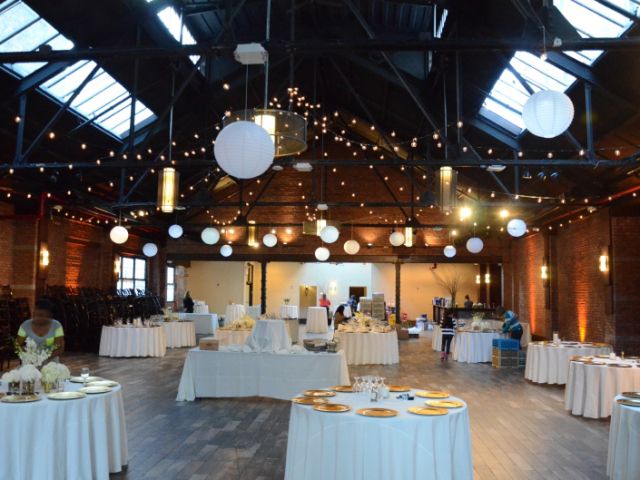 26 Bridge (Brooklyn, New York) - 400ft of String Lights suspended with G50 bulbs in Circular Pattern above the center of the main room w/ Paper Lanterns.