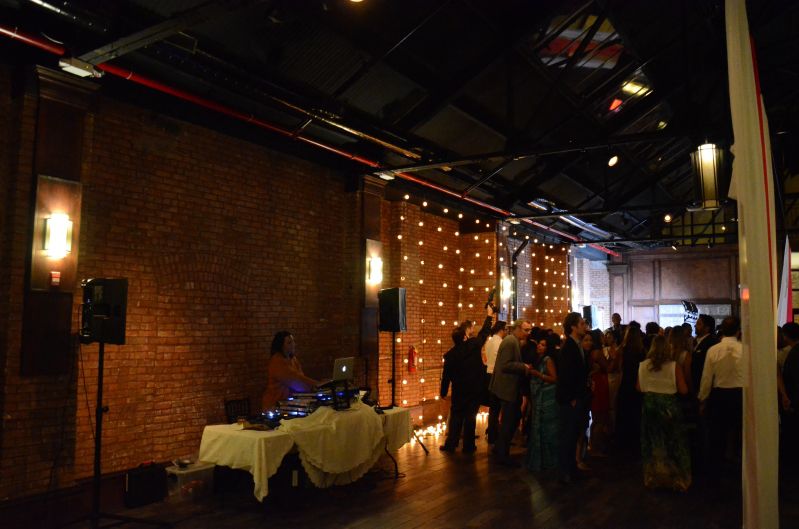 26 Bridge (Brooklyn, New York) - String Lights with G50 bulbs suspended vertically against wall adjacent to the dance floor.