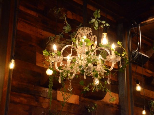 The Brooklyn Winery (Brooklyn, New York) - Chandeliers with Ivy suspended with Pendant Lamps in the Atrium