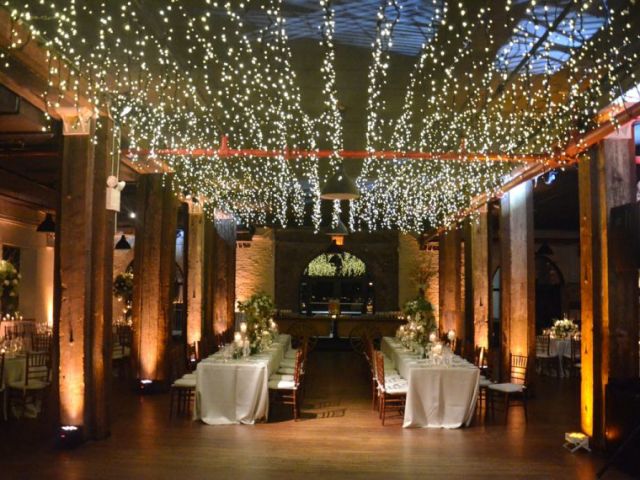 The Liberty Warehouse (Brooklyn, New York) - Icicle (Fairy) Lights suspended between center columns with Up-Lights