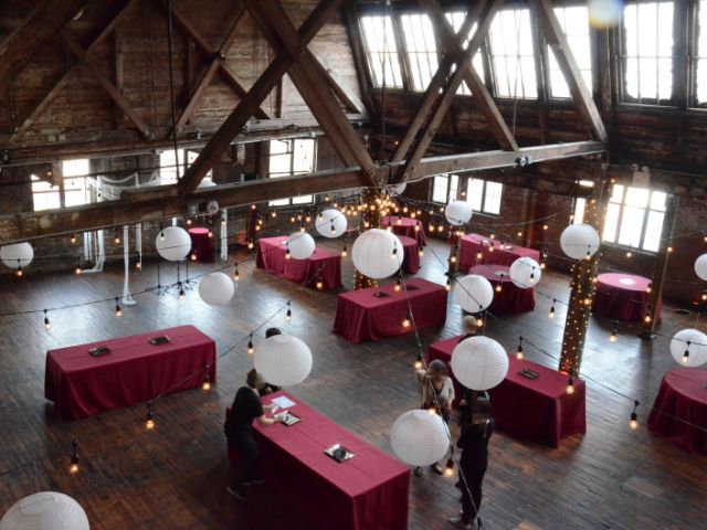 The Greenpoint Loft (Brooklyn, NY) - 600ft of String Lights with S14 bulbs suspended in a circular pattern with Paper Lanterns