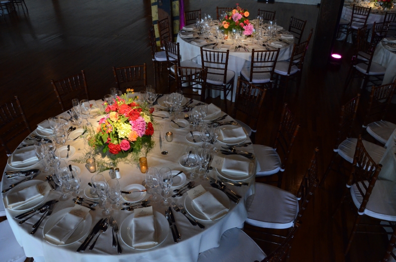 pin-spots focused on table centerpieces for wedding reception on the first floor of The Liberty warehouse located in Brooklyn, New York