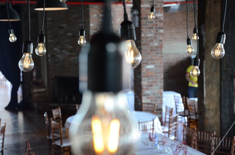 The Liberty Warehouse (Brooklyn, New York) - Pendant Lamps with Antique Edison bulbs Suspended over dance floor