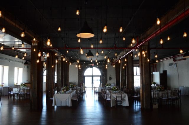 Pendant Lamps suspended over dance floor on 1st floor at The Liberty Warehouse located in Brooklyn, NY