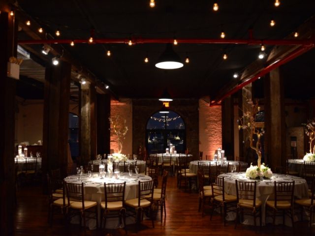 The Liberty Warehouse (Brooklyn, New York) - String Lights with S14 bulbs suspended in a Zigzag pattern over dance floor with Table Centerpiece Pin-Spots with Up-Lights along Perimeter Wall