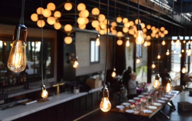 Pendant Lamps with vintage antique bulbs suspended for a wedding reception at 501 Union located in Brooklyn, New York