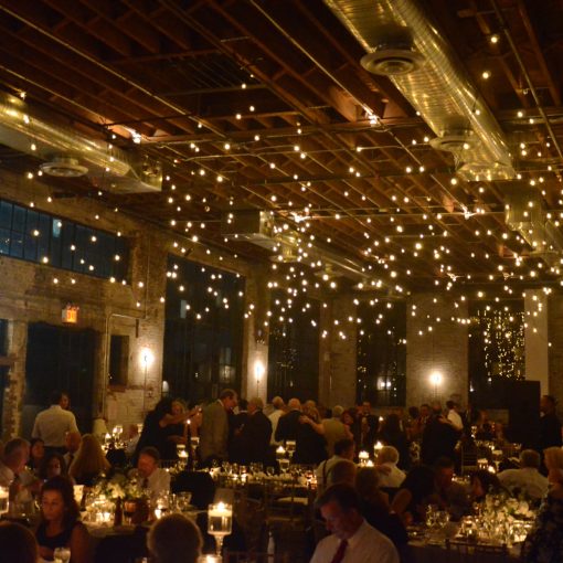 String Lights suspended over dance floor at 99 Scott located in Brooklyn, New York