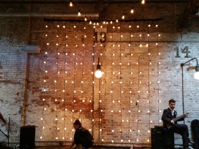 The Houston Hall (New York, NY) - String Lights suspended Vertically as a backdrop against Wall
