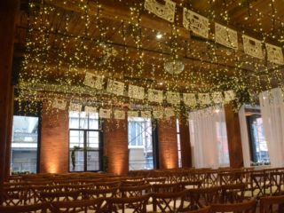 The Dumbo Loft (Brooklyn, New York) - Icicle (Fairy) Lights suspended between the center columns at The Dumbo Loft with Up-Lights along the perimeter walls