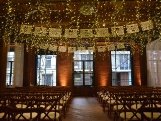 The Dumbo Loft (Brooklyn, New York) - Icicle (Fairy) Lights suspended between the center columns at The Dumbo Loft with Up-Lights along the perimeter walls