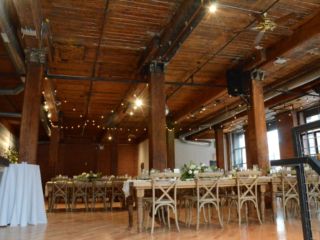 The Dumbo Loft (Brooklyn, New York) - String Lights suspended in a zigzagging pattern between center columns