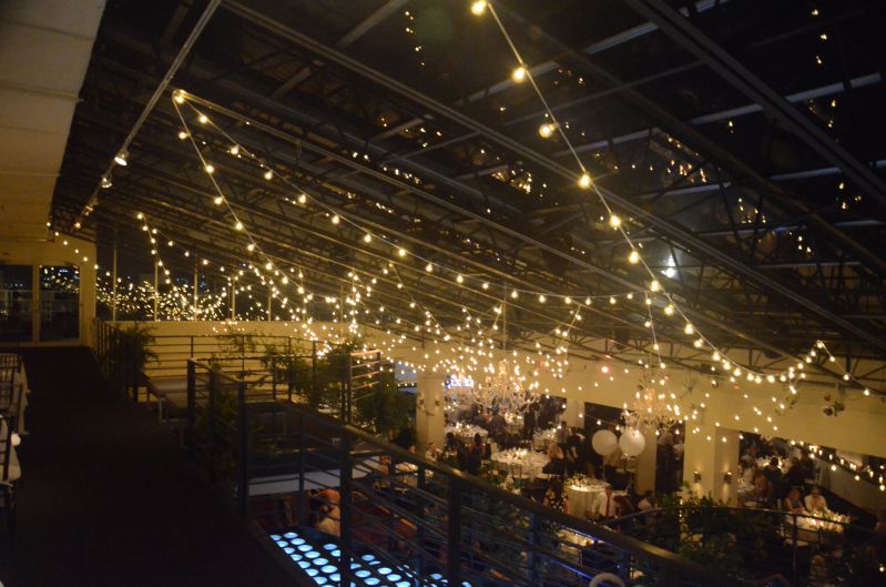 The Tribeca Rooftop (New York, NY) - String Lights suspended in a random zigzagging pattern over dance floor