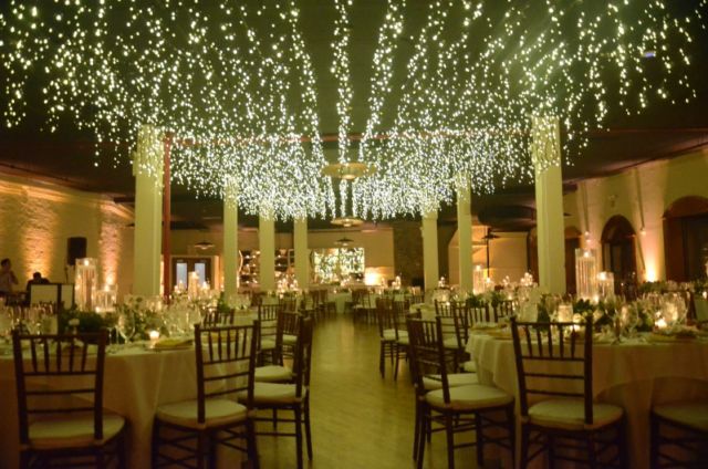 icicle fairy lights suspend columns in the 2nd floor reception room with at The Liberty Warehouse located in Brooklyn New York