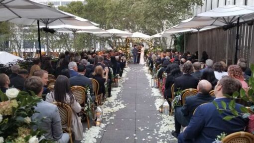 Spotlights for a wedding ceremony at The Bryant Park Grill on The Rooftop Terrace in New York City