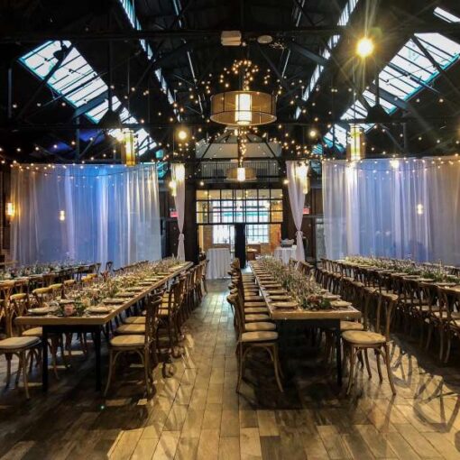 String Lights hanging in a two circular patterns for a wedding at 26 Bridge (Brooklyn, NY)