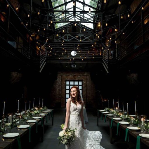 String lights with warm white bulbs are hanging overhead in the main room at The Foundry.
