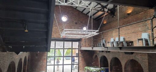 The Foundry suspended Mini triangular truss for florist hanging florals for a Wedding Reception at The Foundry in Long Island City, NY.