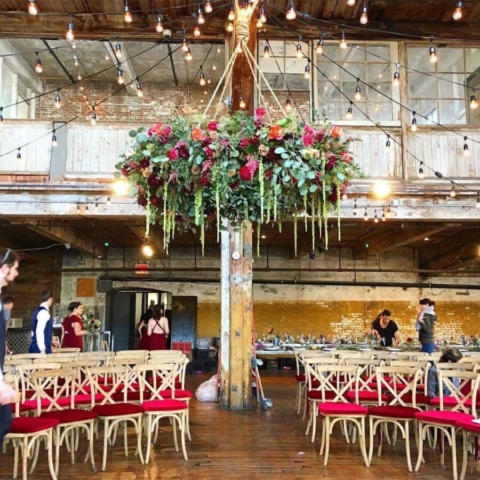 String Lights with floating floral installation The Greenpoint Loft located in Brooklyn, New York