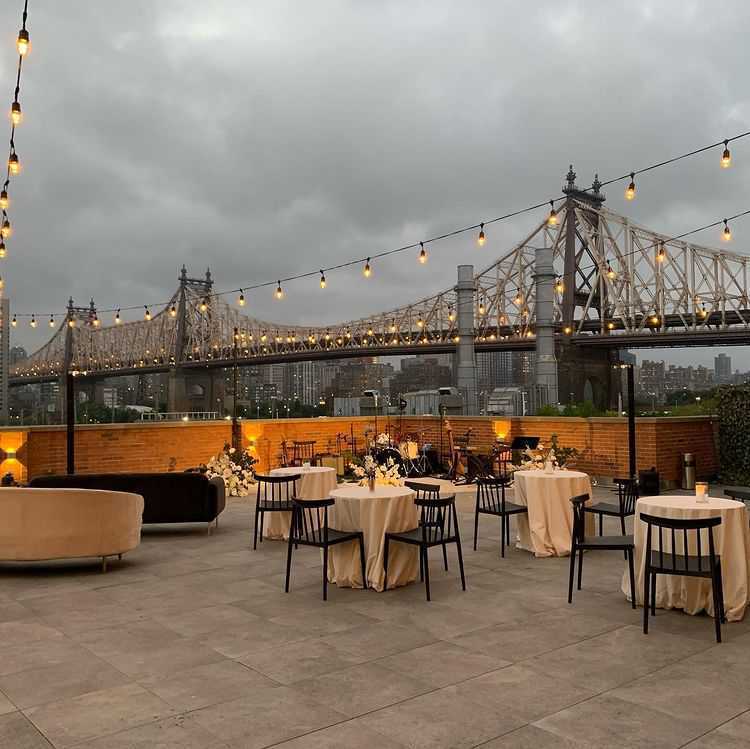 String Lights with stands hanging in the outdoor terrace on the 3rd floor at The Bordone (L.I.C, NYC)