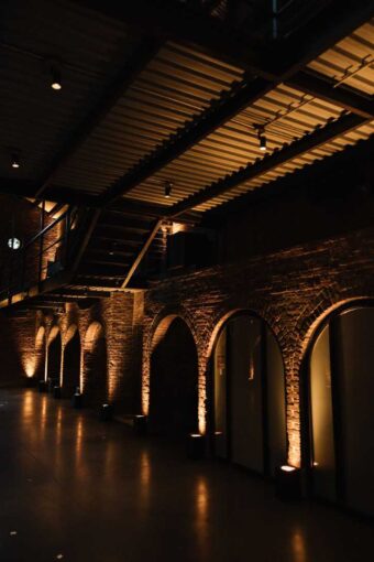 Up-Lights placed along the perimeter walls and outside base of each alcove in The Main Room at The Foundry.