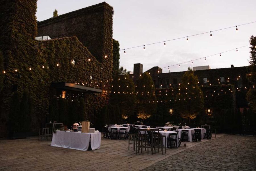 String Lights hanging over the rear courtyard for an outdoor wedding reception at The Foundry.