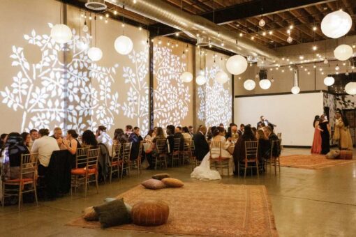 Stock Gobo images projected on wall along with String Lights w/ Paper Lanterns hanging above The Main Room at Dobbin St.
