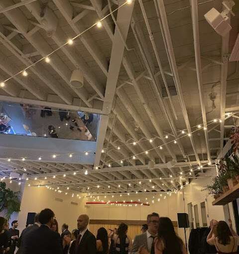 String Lights hanging above The Norman Garden at Rule of Thirds in Brooklyn, NY