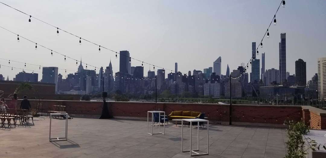 String Lights with stands hanging in the outdoor terrace on the 3rd floor at The Bordone (L.I.C, NYC)