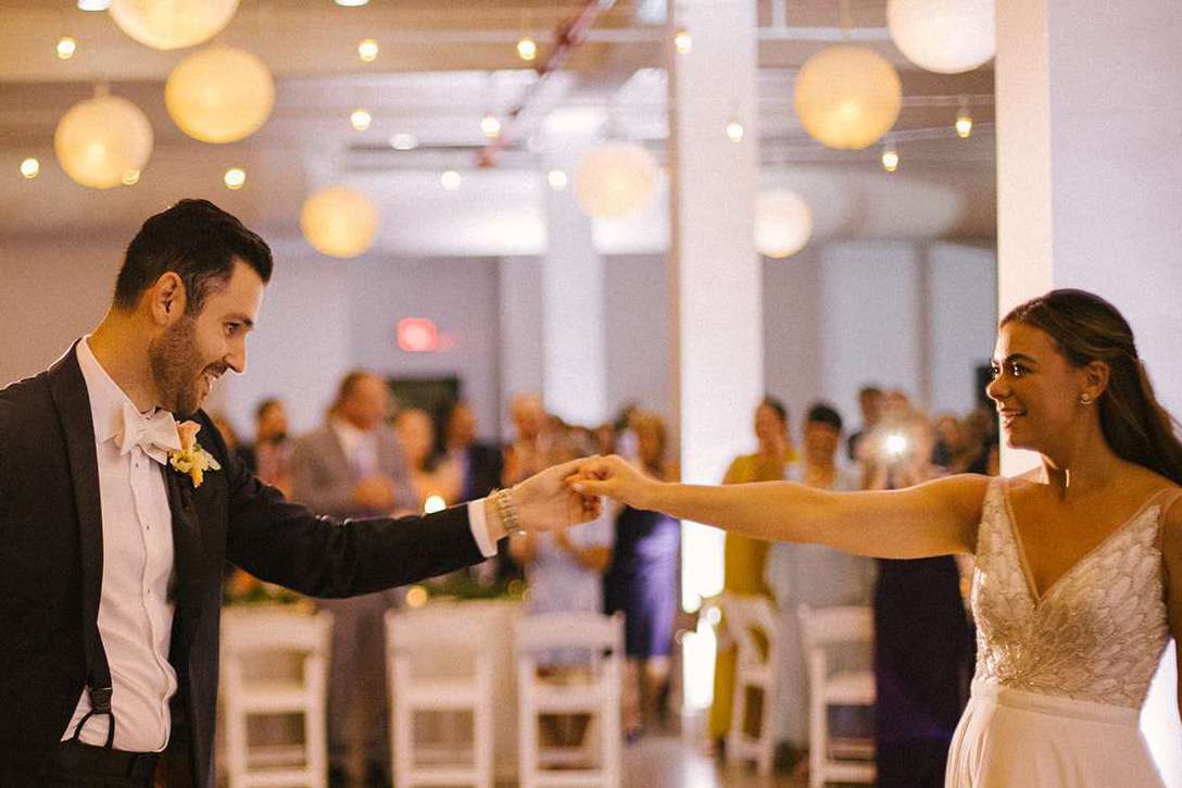 A combination of String Lights and White Paper Lanterns hanging together in the 3rd-floor reception room at The Bordone (Long Island City, New York City)