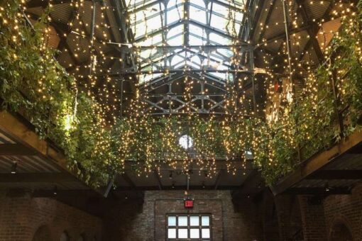 Icicle lights (fairy lights) suspended above the main room at The Foundry located in Long Island City (Queen, NY)