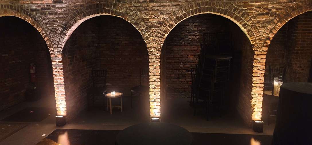 The Foundry - Long Island City, New York - The Main Room with warm white up-lights outside each alcove