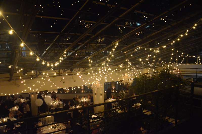 String Lights hanging in a random zigzagging pattern above the dance floor at The Tribeca Rooftop (New York, NY)