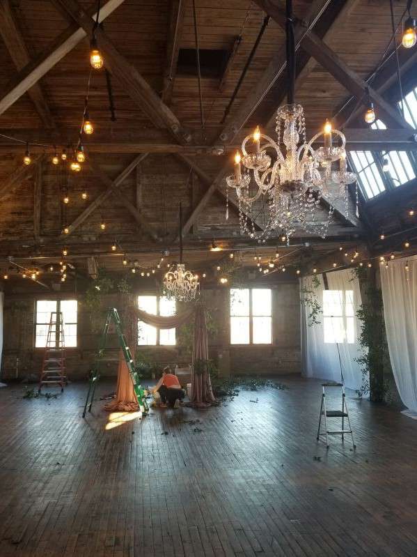 A Wedding with Chrystal Chandeliers and String Lights at The Greenpoint Loft in Brooklyn, NY.