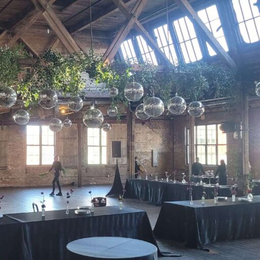 A cluster of disco balls at a wedding reception hosted at The Greenpoint Loft in NYC.