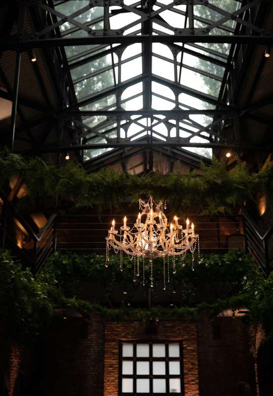 A 40" Crystal Chandelier suspended in the main room for a wedding at The Foundry (Long Island City, NY).