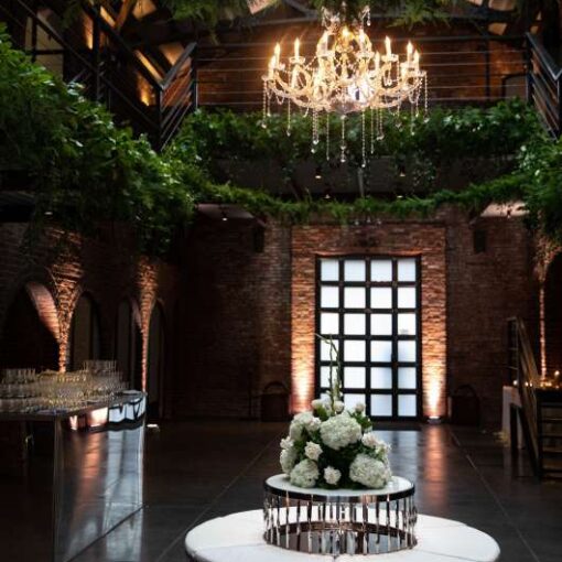 A 40" Crystal Chandelier suspended in the main room for a wedding at The Foundry (Long Island City, NY).