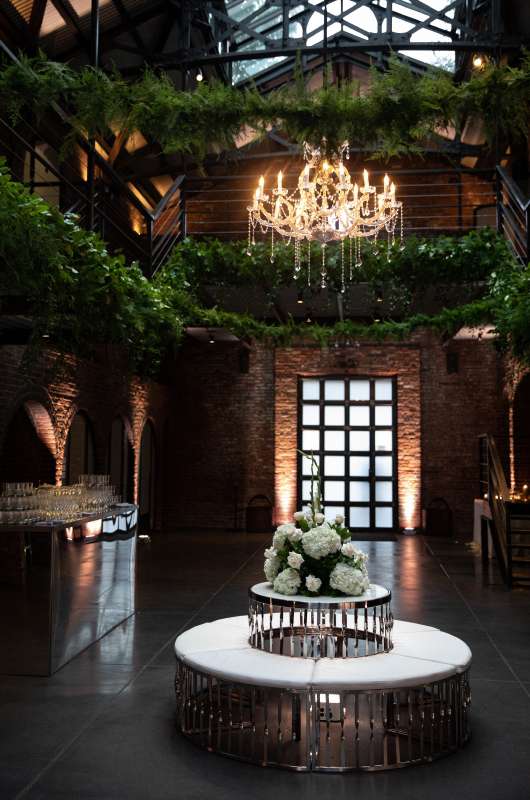A 40" Crystal Chandelier suspended in the main room for a wedding at The Foundry (Long Island City, NY).