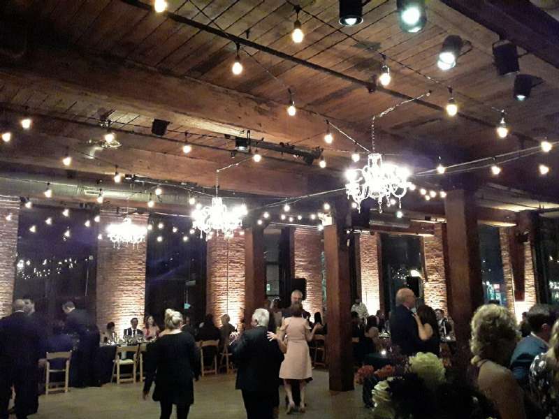 24" Chrystal Chandeliers with String Lights and Up-Lights at The Dumbo Loft.