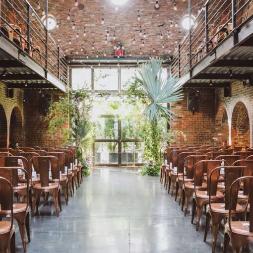String Lights hanging in the main room for a wedding at The Foundry.